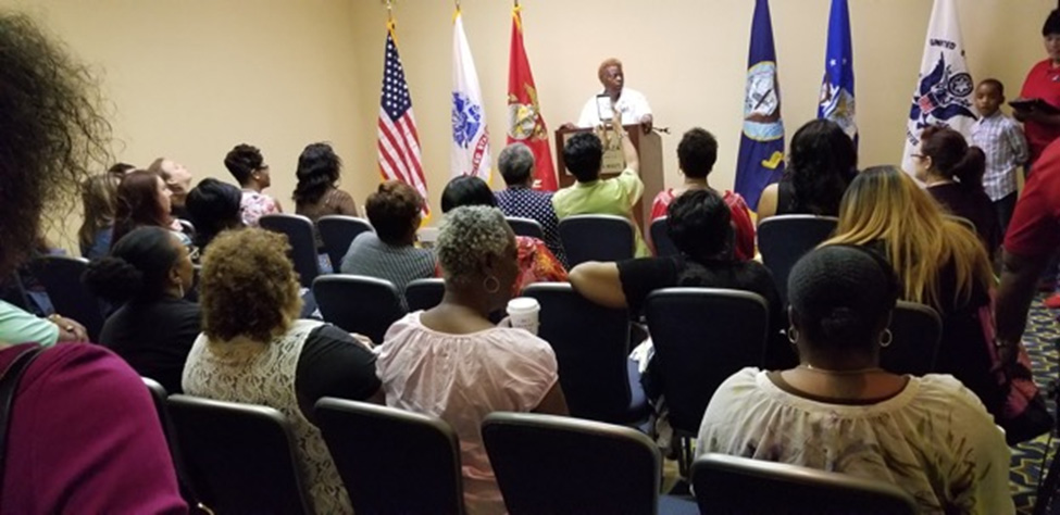 AVWA Co-founder Dionne Archibald speaking to local leaders about VA benefits and entitlements.